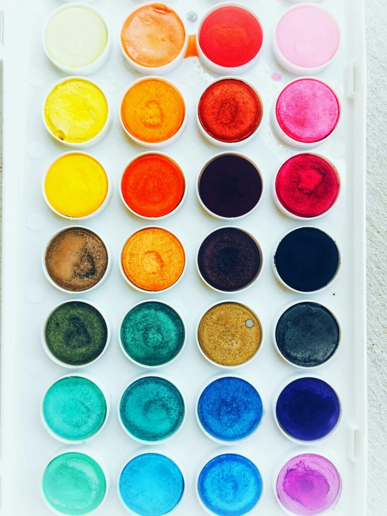 Multicolored pastel paints representing color psychology in home design