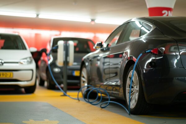 Modern efficient car in a parking lot representing hybrid vehicles