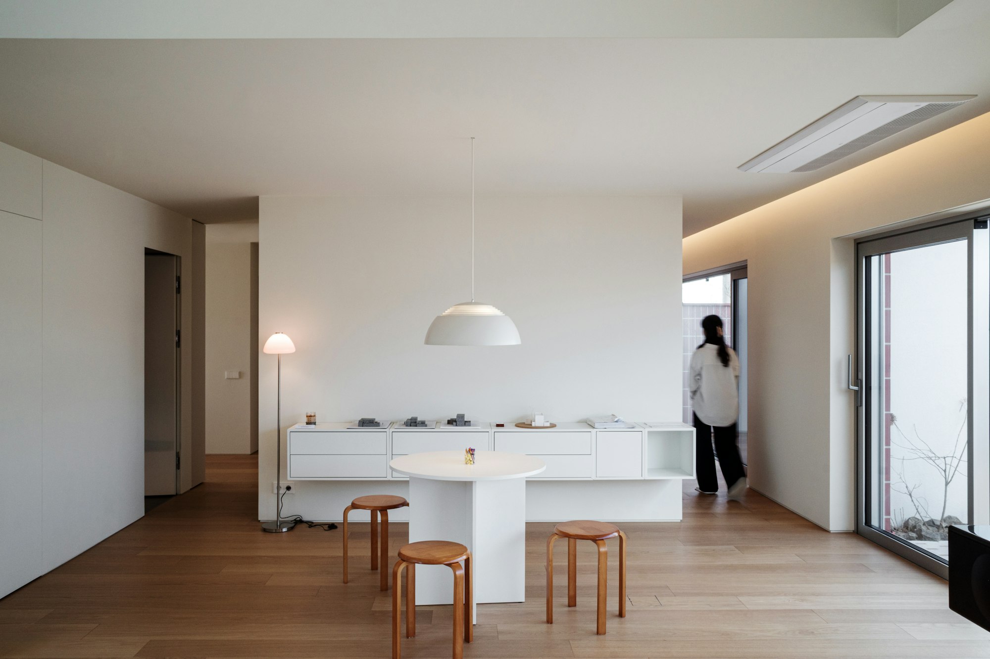 Modern minimalist living room with white furniture